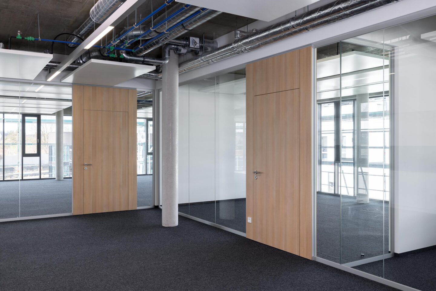 Erhardt + Leimer electrical installations | wooden doors in the office