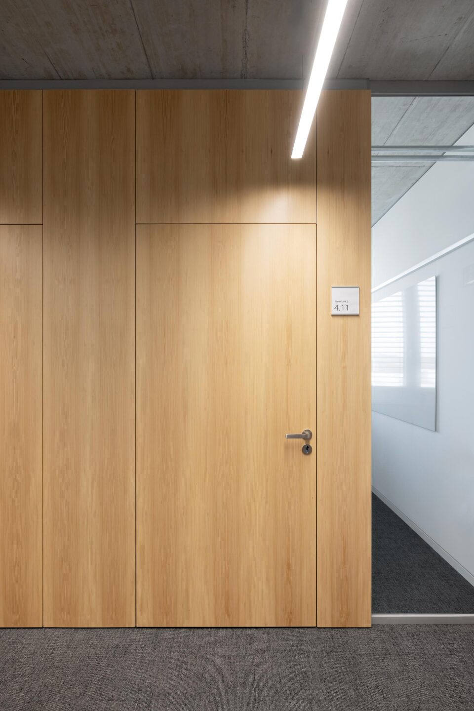 Bucher Automation | View of wooden door and wooden wall